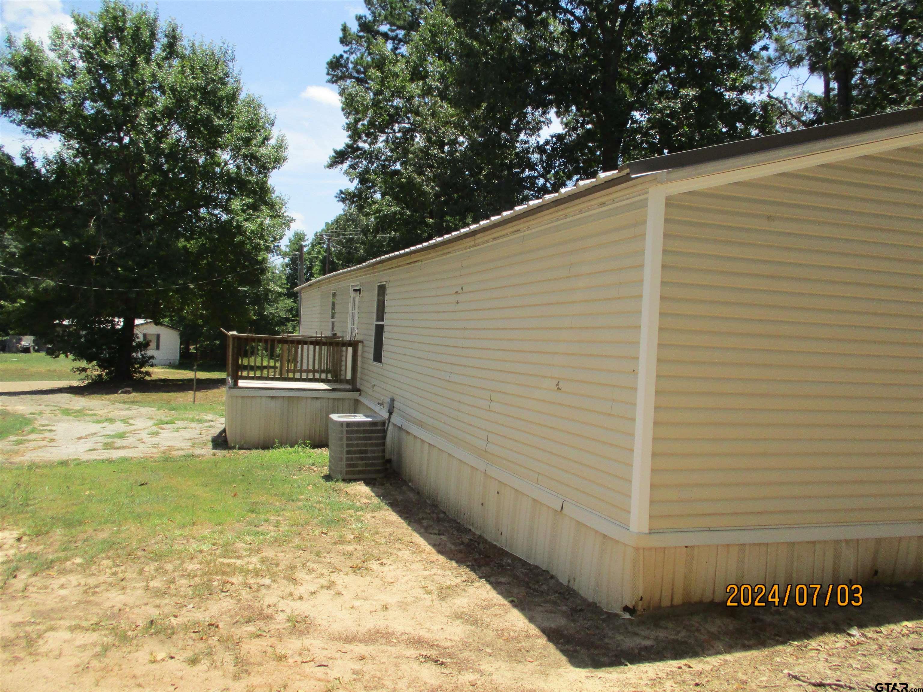 105 Sioux Lane Longview, TX 75603 - Photo 5 of 22 a view of a patio with a yard