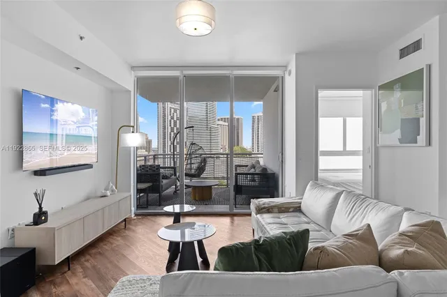 a living room with furniture and a couch