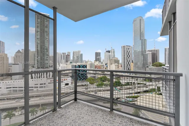 a view of a city with tall buildings