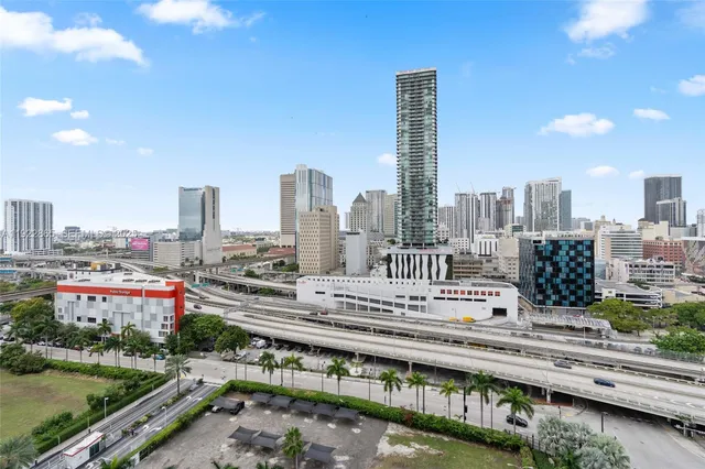 a view of balcony with furniture and city view