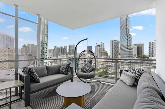 a view of a city with tall buildings