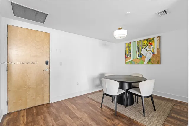 a view of kitchen with sink and cabinets