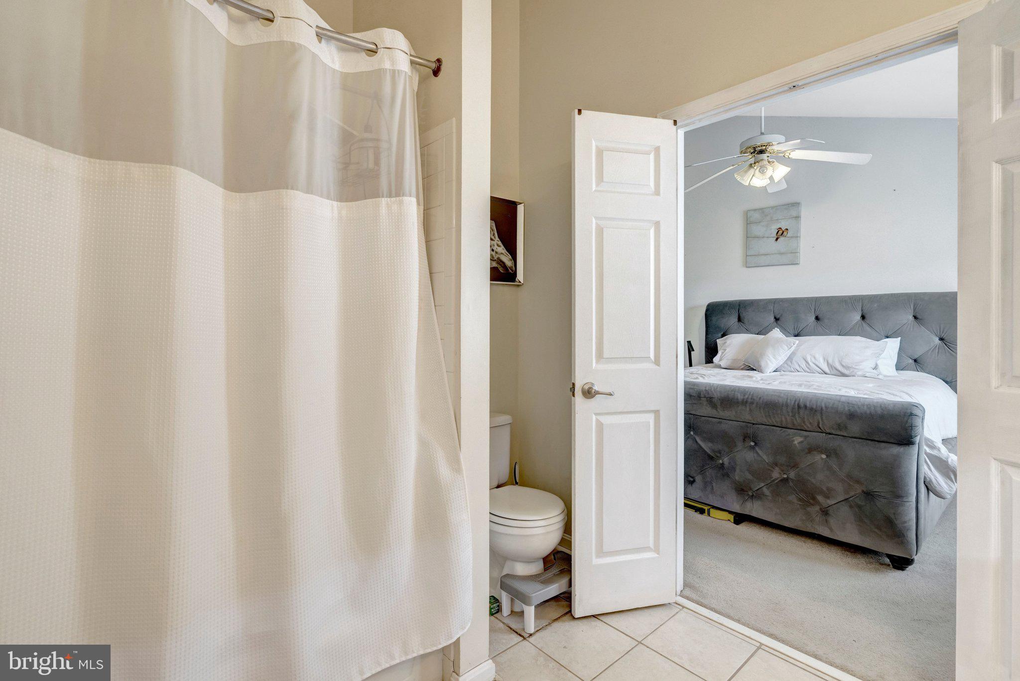 42888 Golf View Drive Chantilly, VA 20152 - Photo 23 of 29 a bathroom with a sink and a mirror