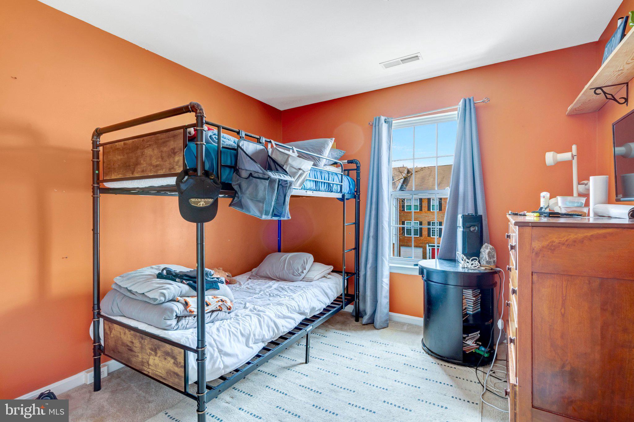 42888 Golf View Drive Chantilly, VA 20152 - Photo 26 of 29 a bedroom with a bed and dresser