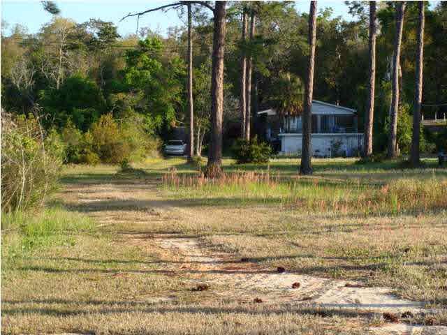 14910 Innerarity Point Road Pensacola, FL 32507 - Photo 14 of 15 VIEW FROM WATER OF HOUSE