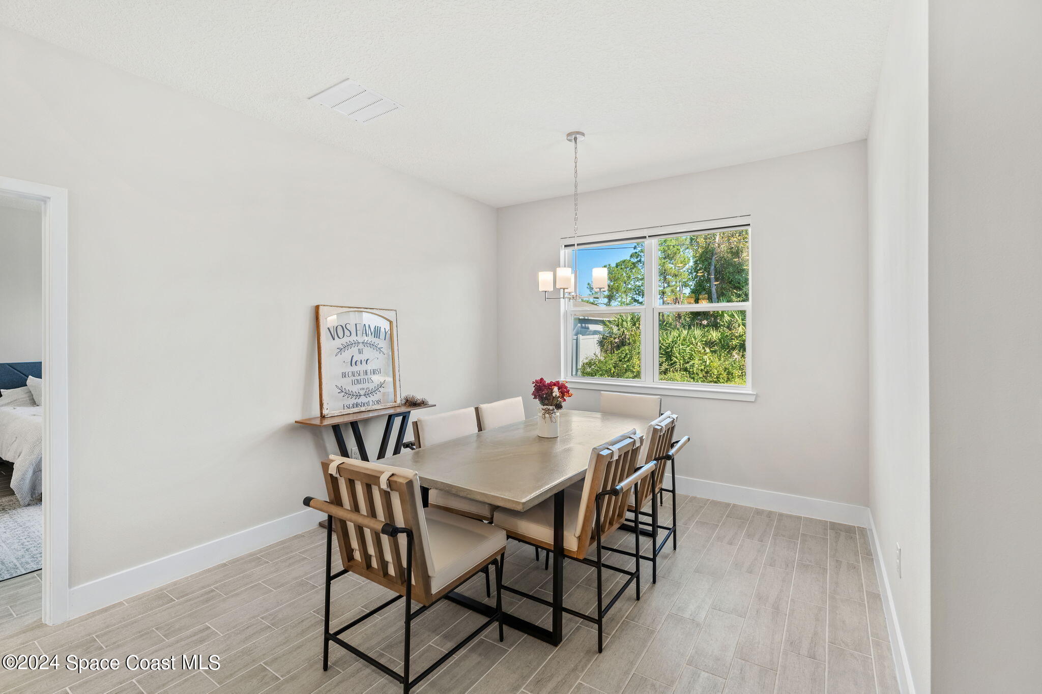 355 Wendover Road Southwest Palm Bay, FL 32908 - Photo 18 of 44 a view of a dining room with furniture window and outside view