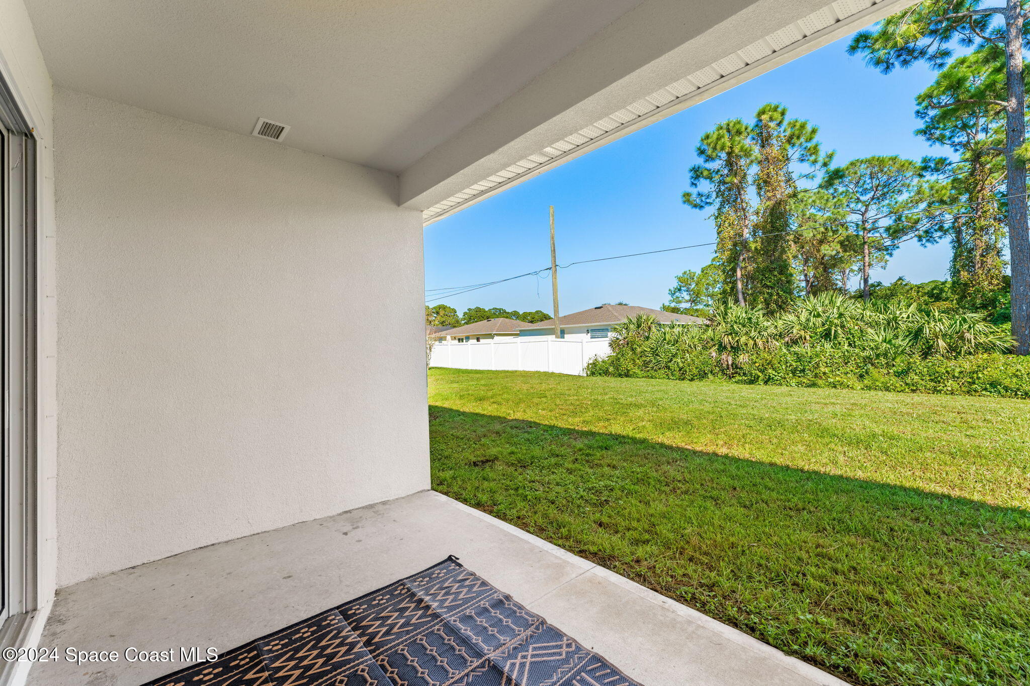 355 Wendover Road Southwest Palm Bay, FL 32908 - Photo 28 of 44 a view of a garden