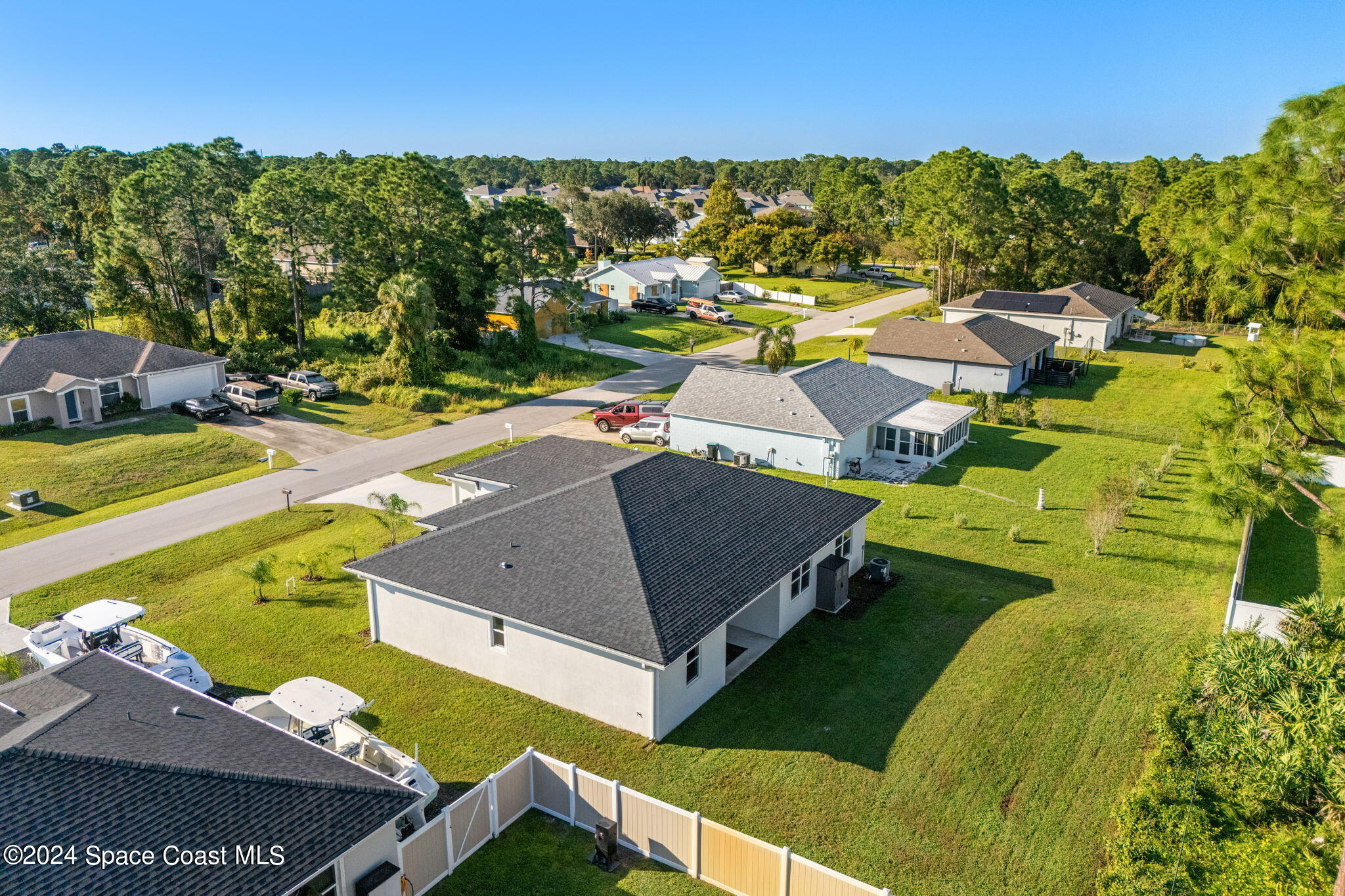 355 Wendover Road Southwest Palm Bay, FL 32908 - Photo 34 of 44 a view of a house with a swimming pool