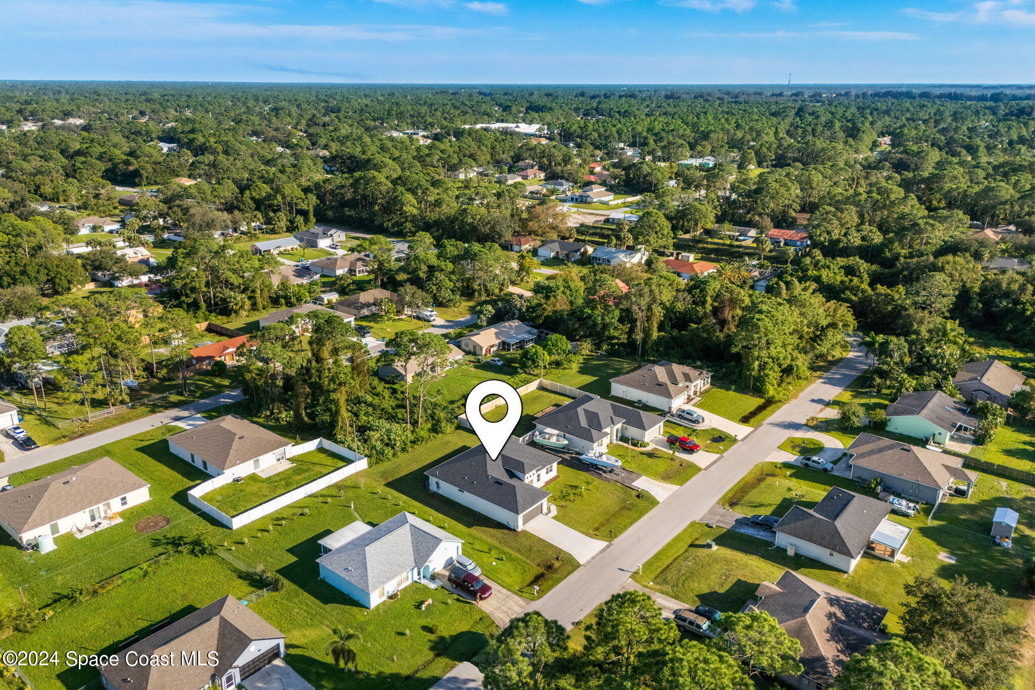 355 Wendover Road Southwest Palm Bay, FL 32908 - Photo 36 of 44 an aerial view of residential house with outdoor space and trees all around