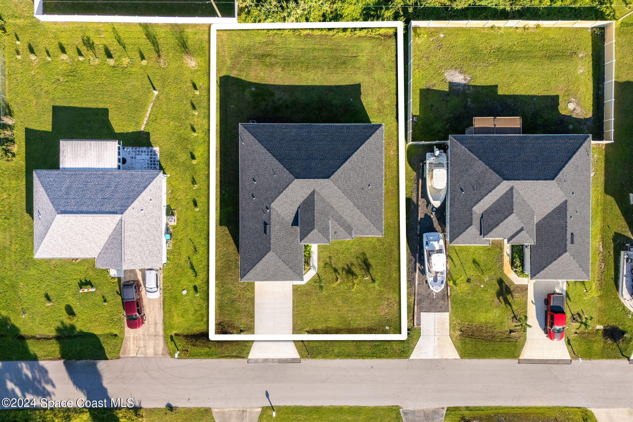 355 Wendover Road Southwest Palm Bay, FL 32908 - Photo 38 of 44 an aerial view of residential houses with outdoor space