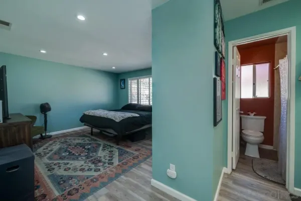 a room with furniture and a rug