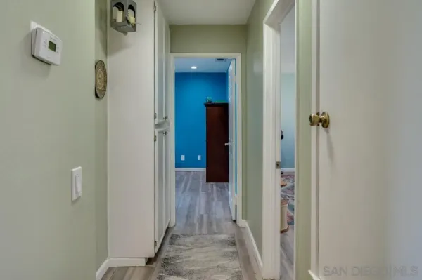a view of a bathroom from a hallway