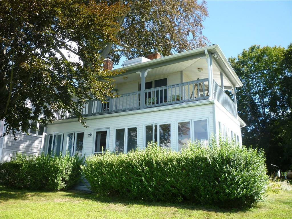 204 Shore Road Waterford, CT 06385 - Photo 1 of 1 a front view of house with yard and green space