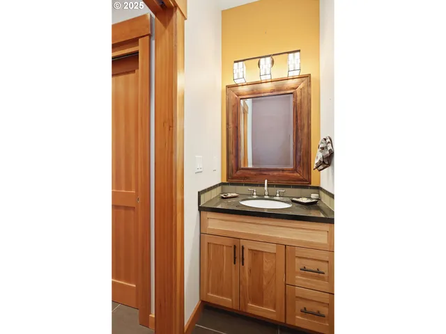 a room with a bed and a large window