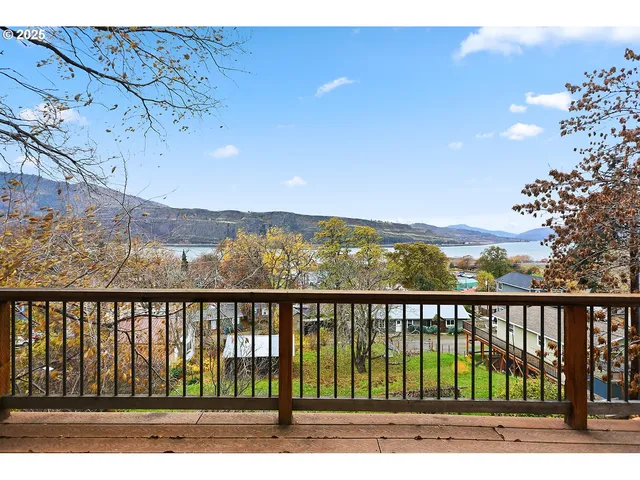 a view of mountain with wooden floor