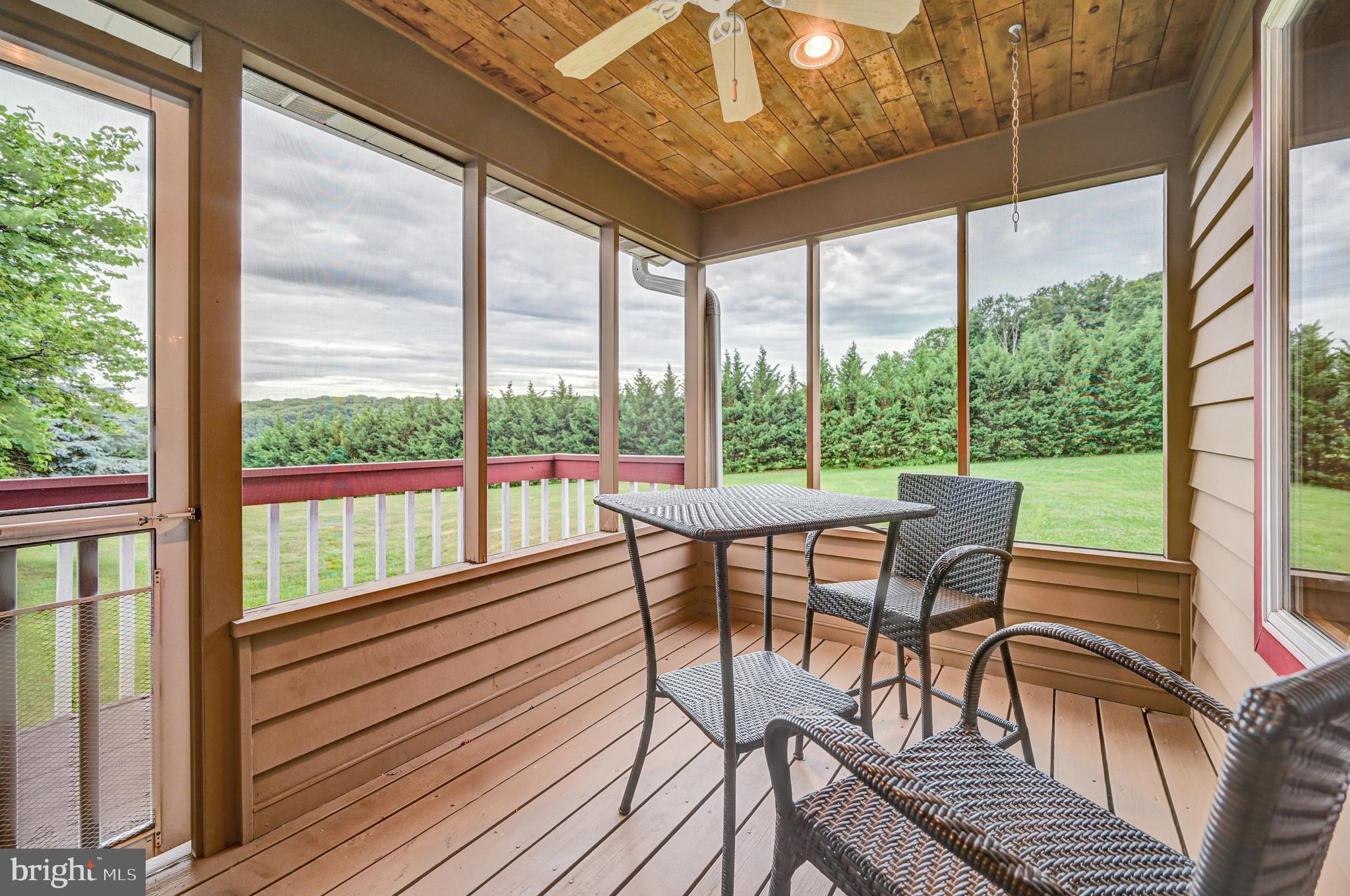 2428 Mt Ventus Road Manchester, MD 21102 - Photo 16 of 39 Screened in porch off the kitchen