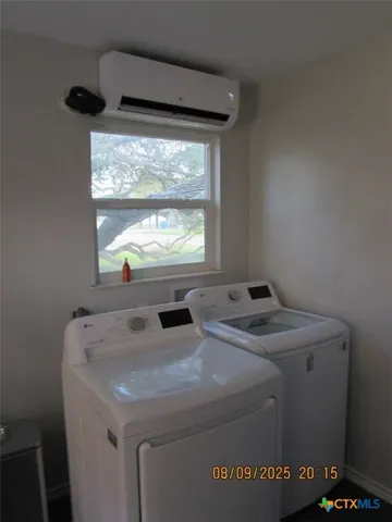 a kitchen with a stove and cabinets