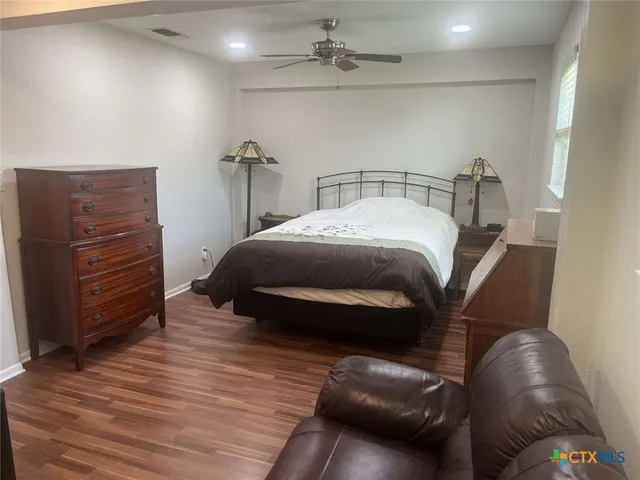 a kitchen with a sink and a stove top oven