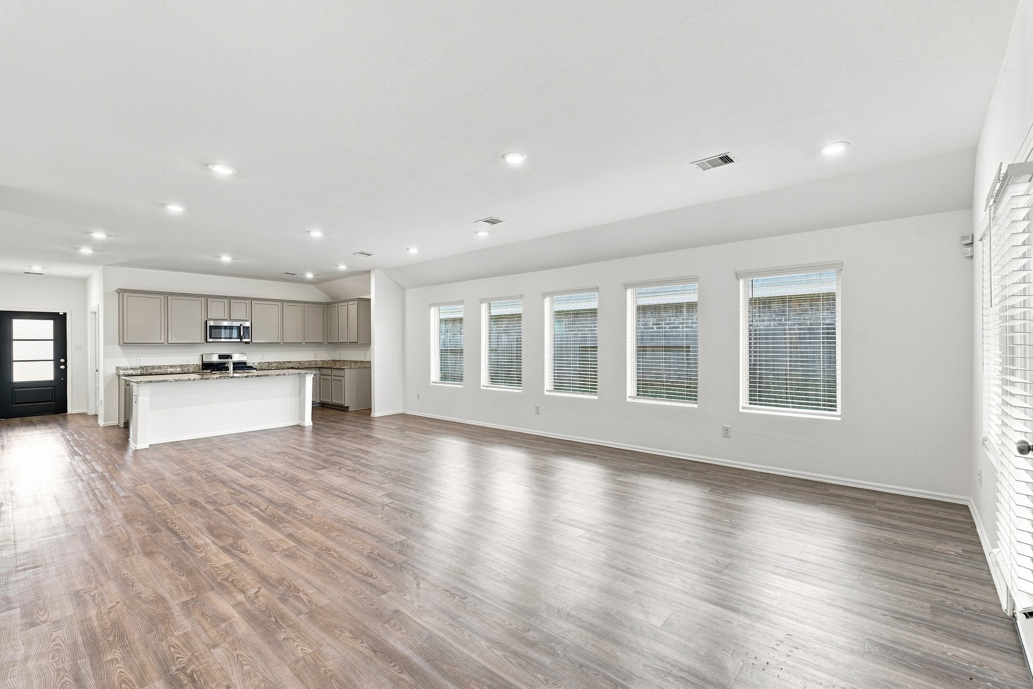 14222 Overbrook Willow Way Rosharon, TX 77583 - Photo 10 of 44 Kitchen open to Dinner are and Living rom