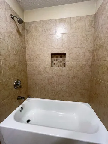 a bathroom with a bathtub