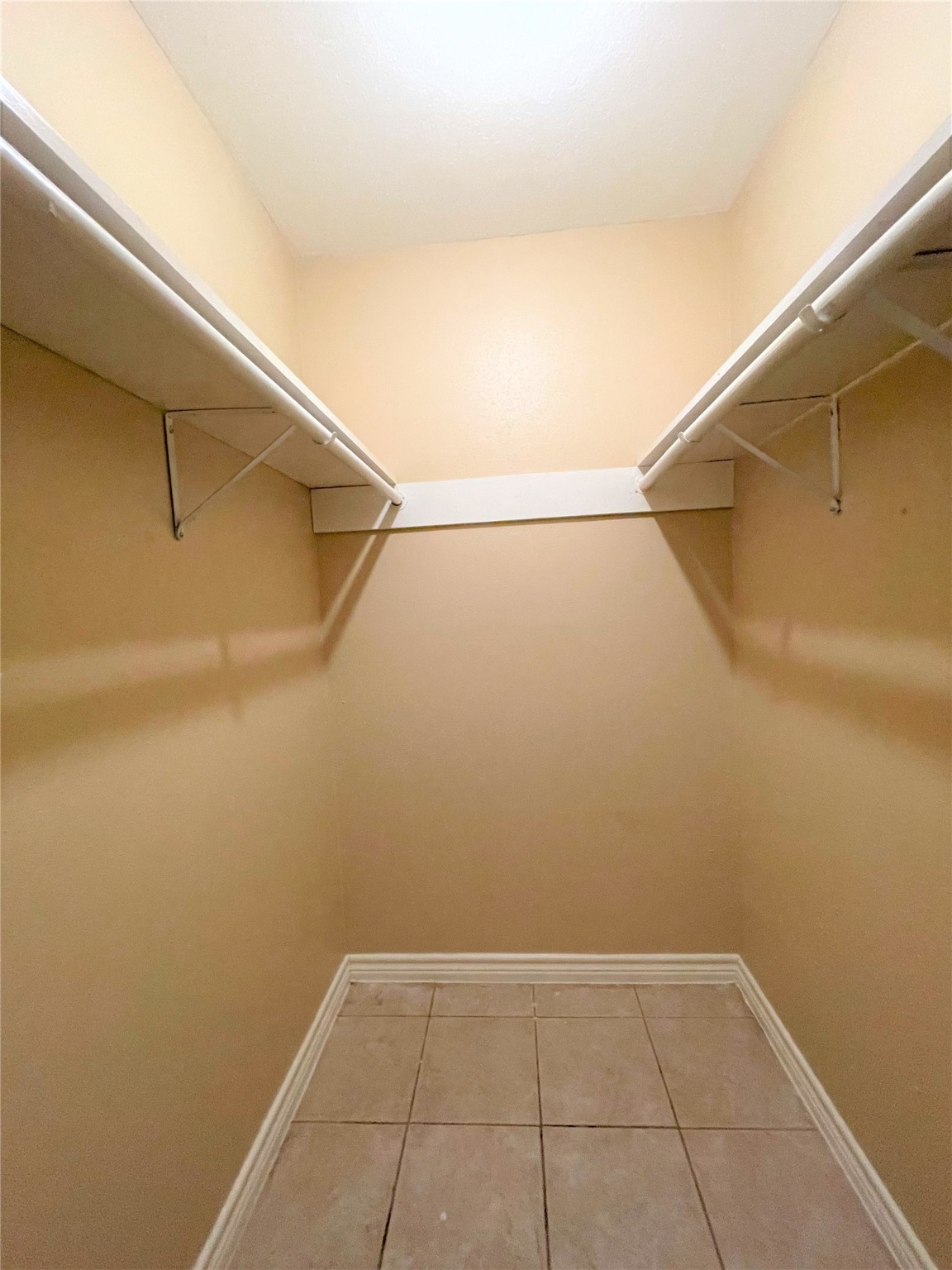 10011 Appleridge Drive Houston, TX 77070 - Photo 15 of 48 a view of a room with racks on the wall