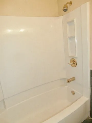 a bathroom with a bathtub