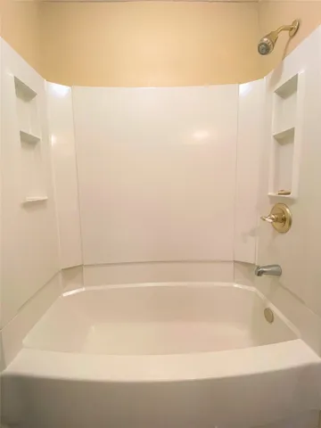 a bathroom with a bathtub