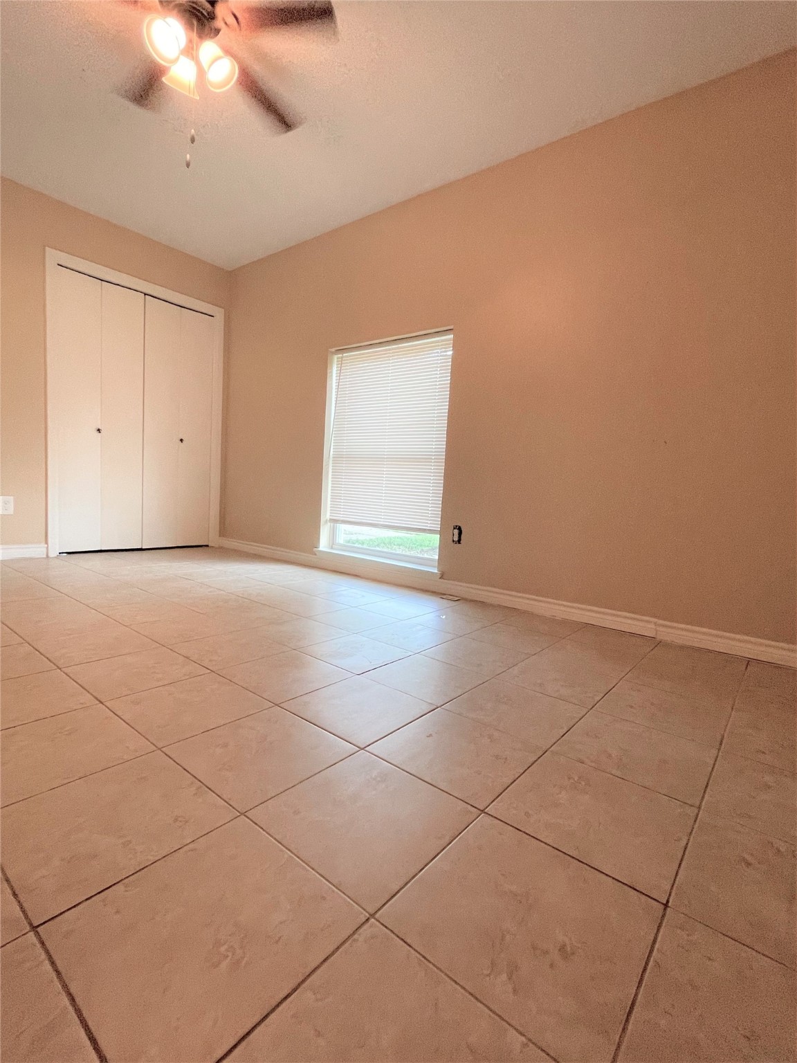 10011 Appleridge Drive Houston, TX 77070 - Photo 20 of 48 a view of an empty room with a window