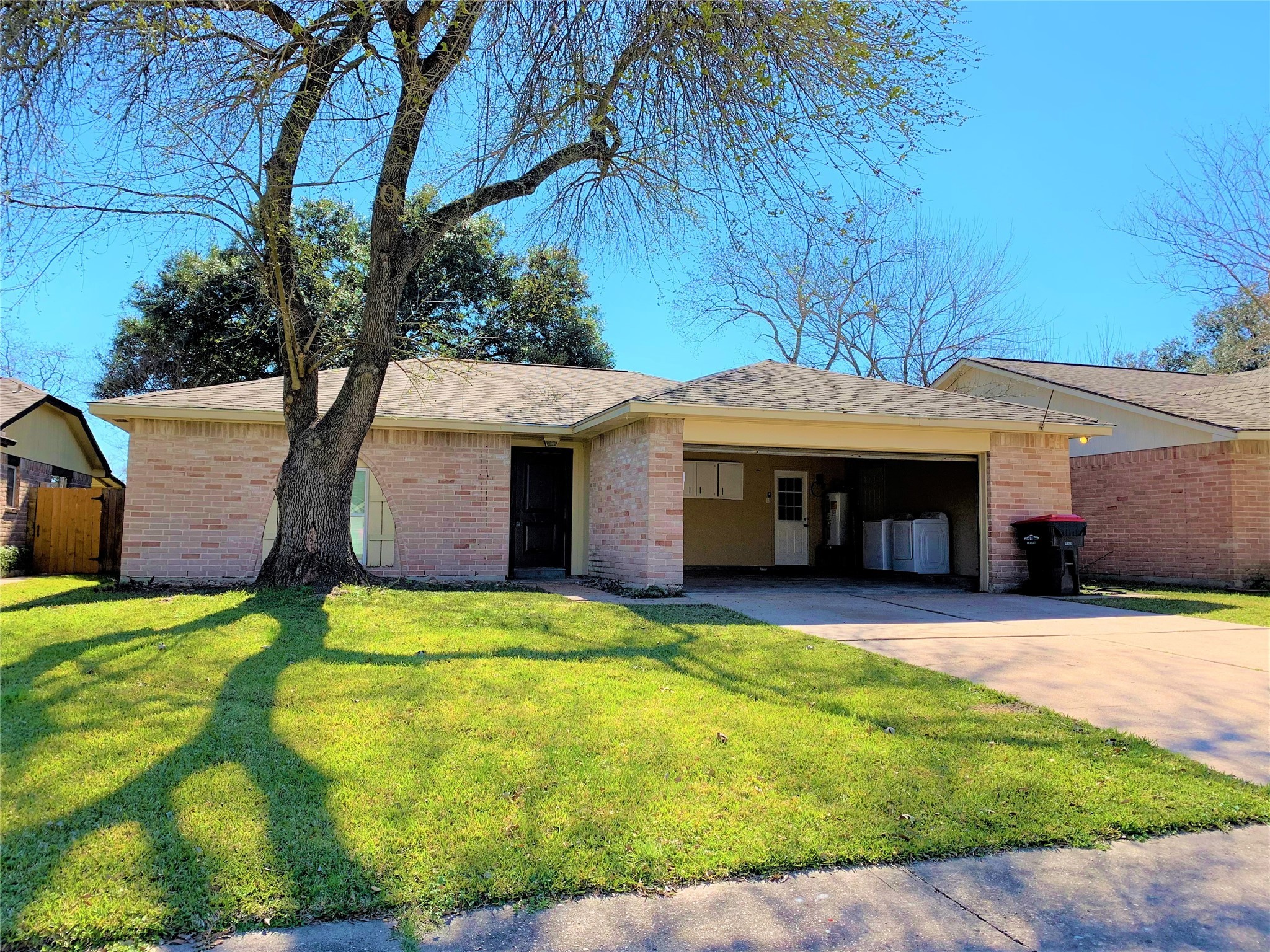 10011 Appleridge Drive Houston, TX 77070 - Photo 2 of 48 a view of a house with a yard and tree s