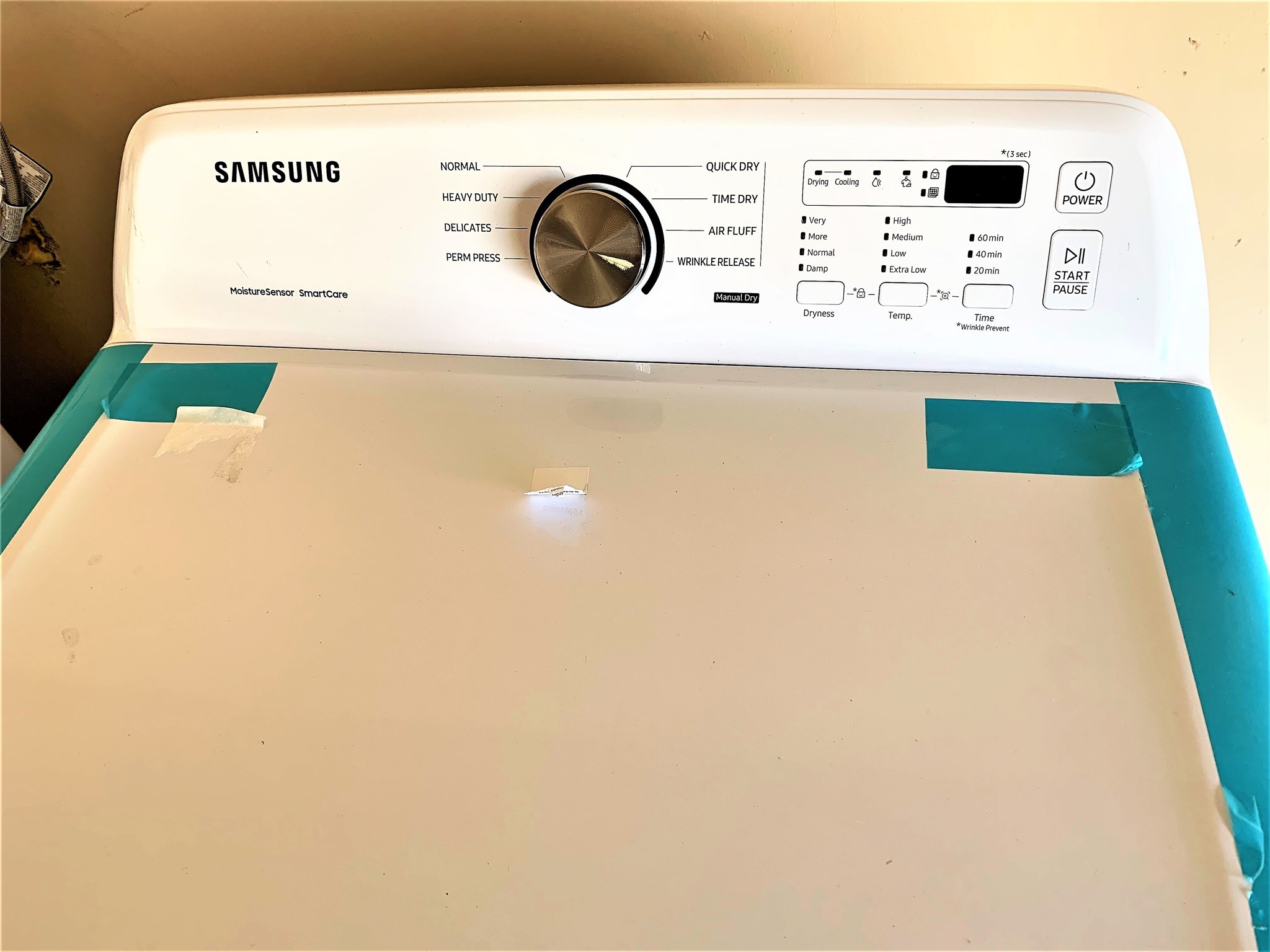 10011 Appleridge Drive Houston, TX 77070 - Photo 31 of 48 a utility room with a fridge and a white wall