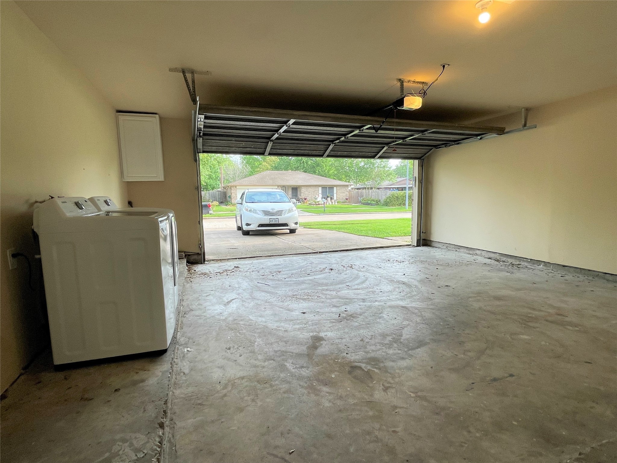 10011 Appleridge Drive Houston, TX 77070 - Photo 32 of 48 a view of an empty room with a fireplace and a large window