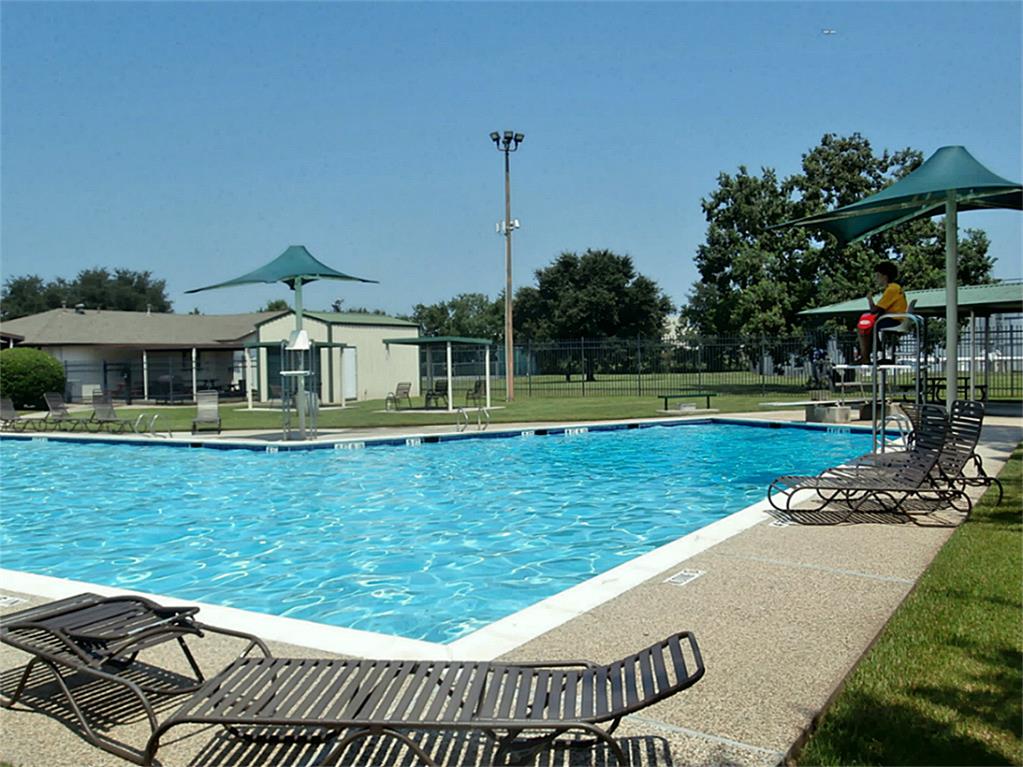 10011 Appleridge Drive Houston, TX 77070 - Photo 40 of 48 a view of a house with a swimming pool
