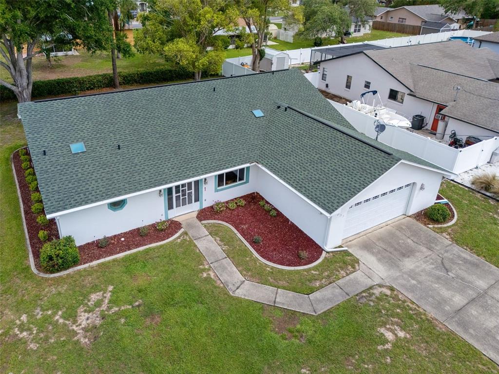 5035 Harbinger Road Spring Hill, FL 34608 - Photo 7 of 47 an aerial view of a house