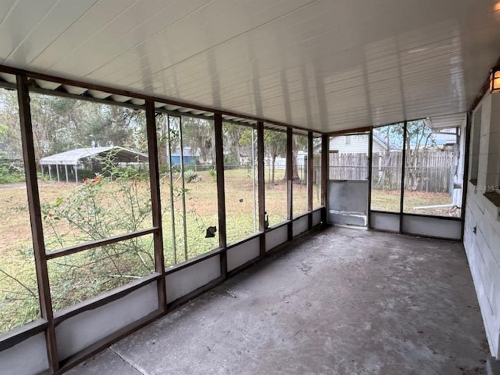 5737 Southeast Babb Road Belleview, FL 34420 - Photo 9 of 11 a view of an empty room with windows