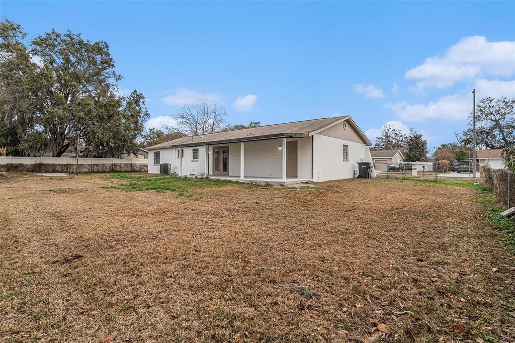 2527 Ridge Top Way Valrico, FL 33594 - Photo 26 of 29 a view of a house with a yard