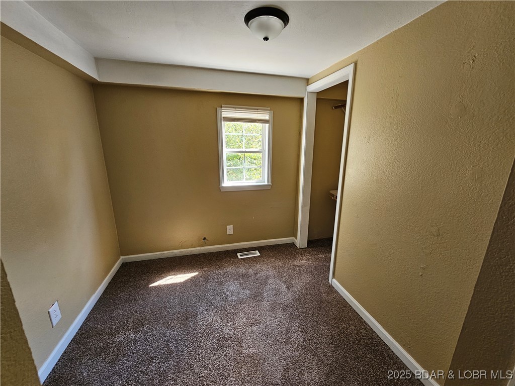 5560 Upper Prairie Hollow Road Macks Creek, MO 65786 - Photo 12 of 18 bedroom 2 back side