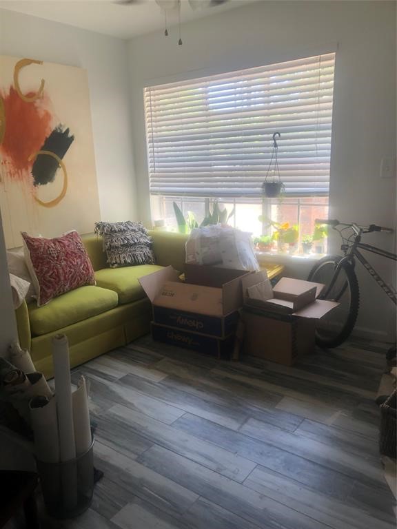 2904 Old Houston Road, Unit 7 Huntsville, TX 77340 - Photo 12 of 19 a living room with furniture and a window