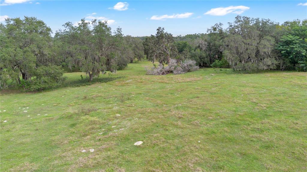 0 Rolling Acres Road Fruitland Park, FL 34731 - Photo 8 of 28 a view of outdoor space and yard