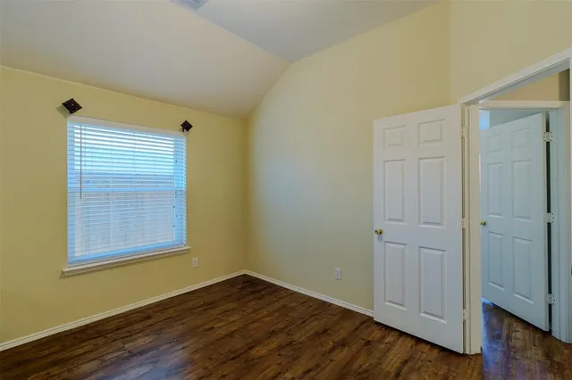 a view of a bathroom from the hallway
