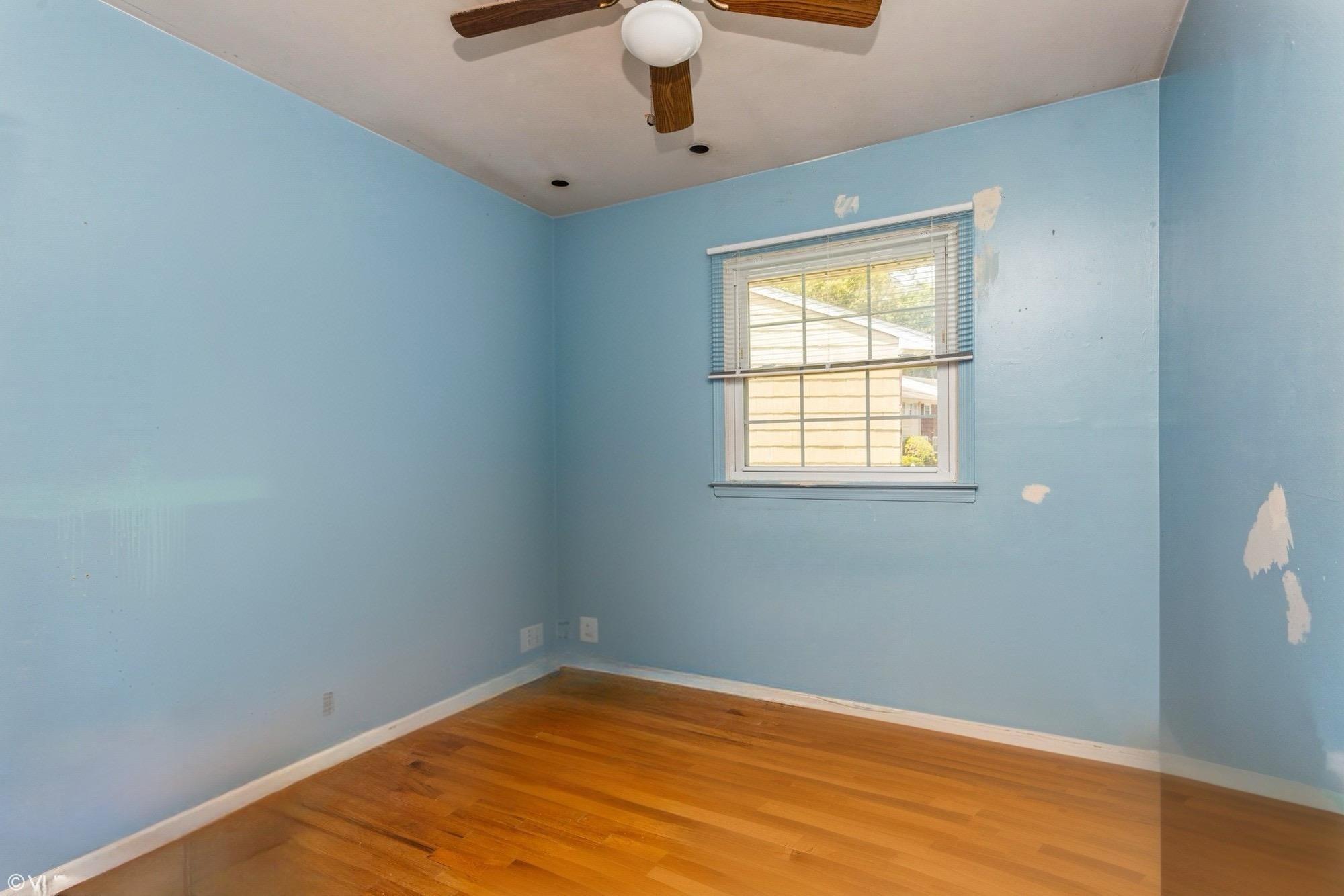 15 Sharon Drive Spring Valley, NY 10977 - Photo 13 of 24 Spare room featuring wood finished floors, ceiling fan, and baseboards