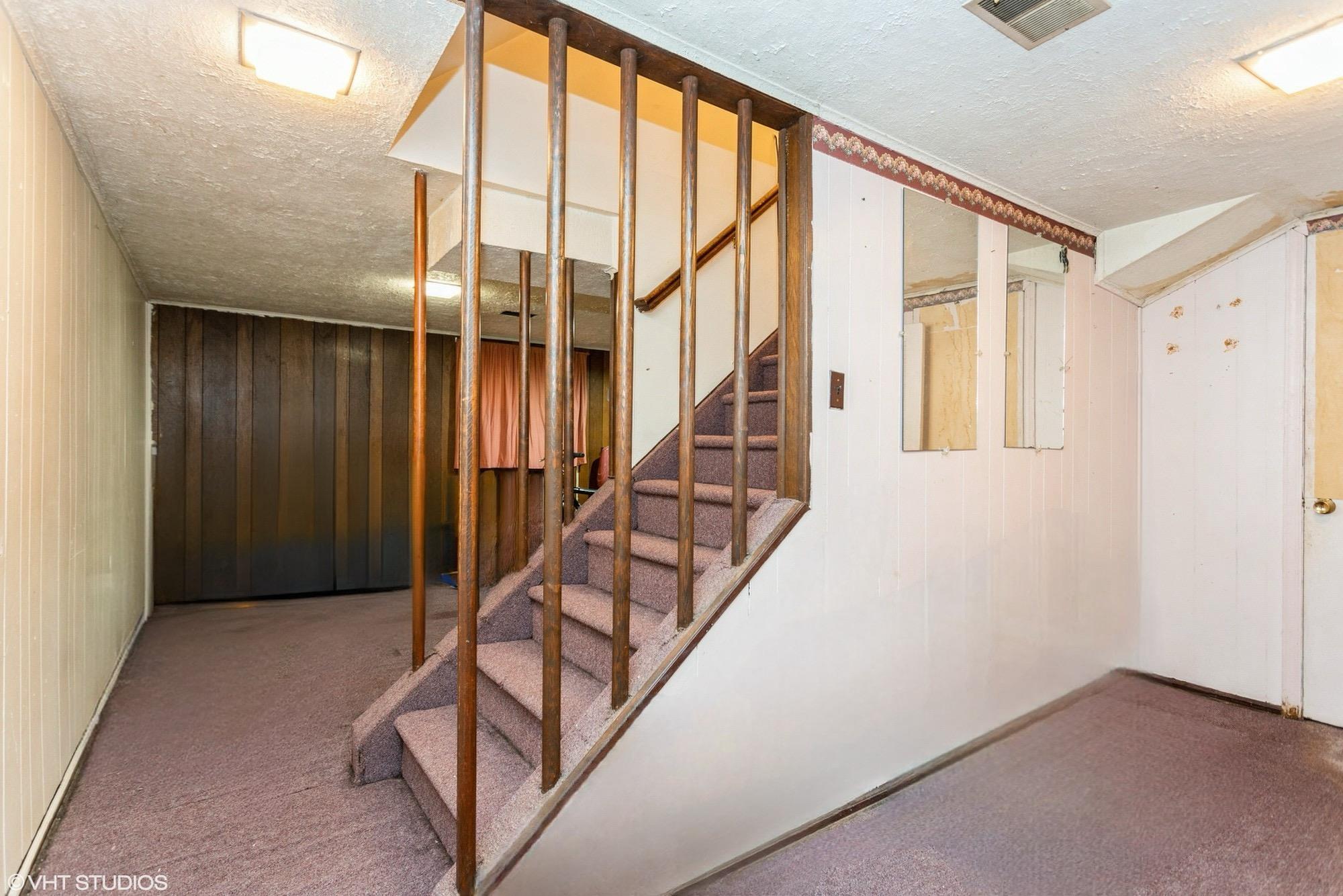 15 Sharon Drive Spring Valley, NY 10977 - Photo 15 of 24 Finished basement with a textured ceiling, stairs, carpet floors, and baseboards