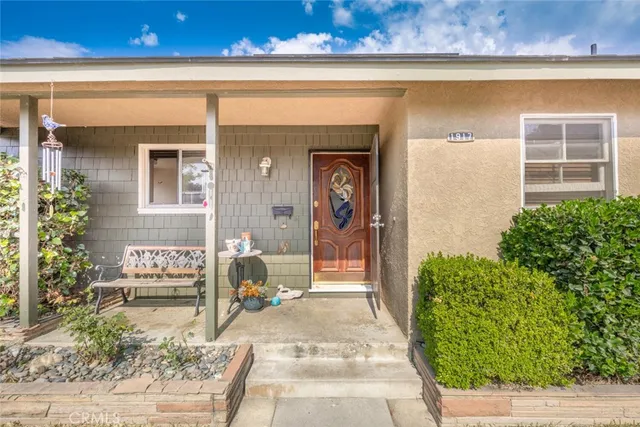 a kitchen with stainless steel appliances a sink stove and cabinets