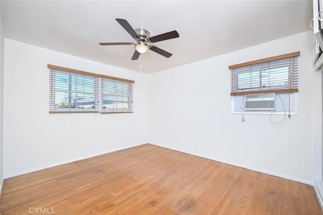 a view of backyard with swimming pool and outdoor seating
