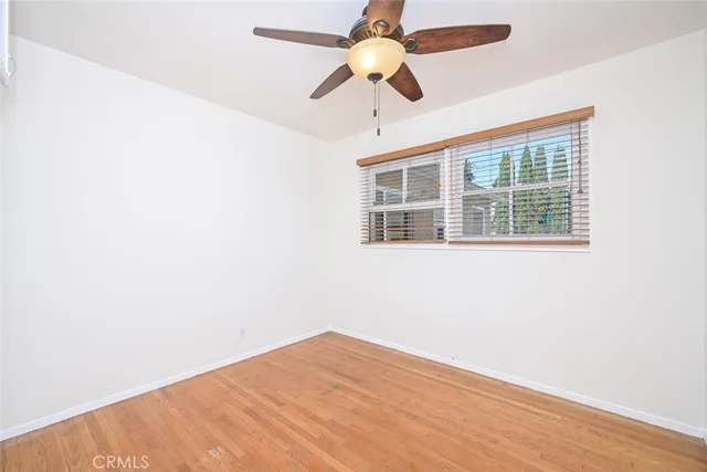 a view of a swimming pool with an outdoor seating