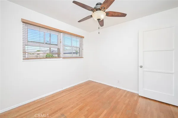 a patio with a patio table and chairs
