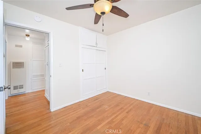 a view of backyard with outdoor seating and plants