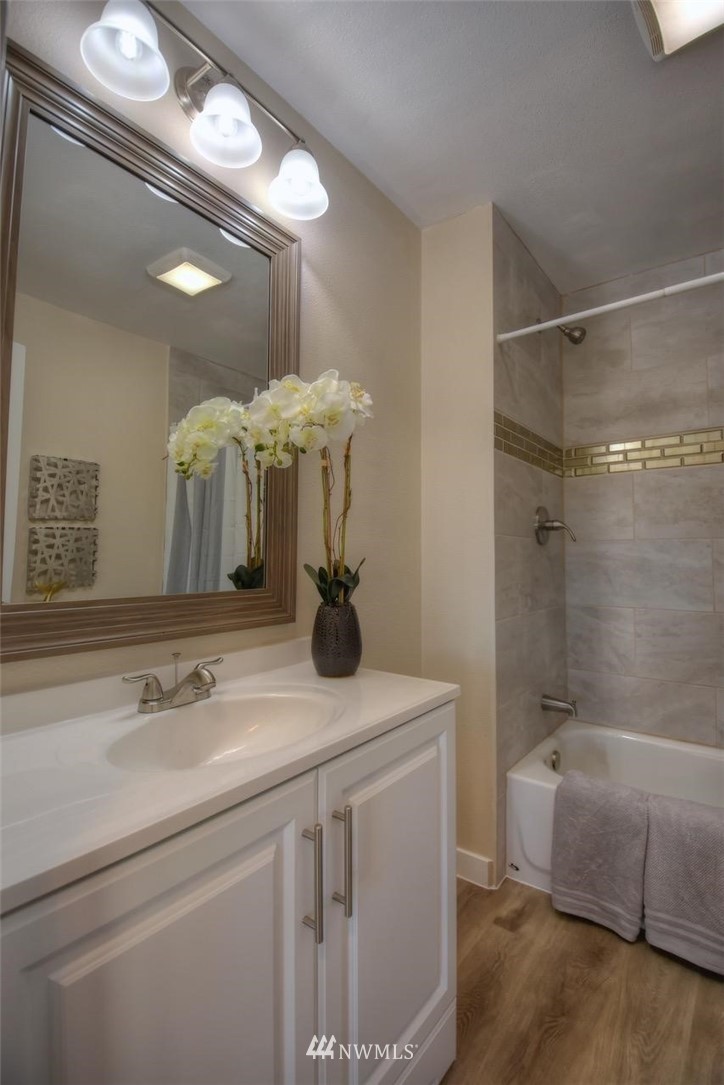 8231 James Road Southwest Rochester, WA 98579 - Photo 14 of 25 a bathroom with a sink and a mirror