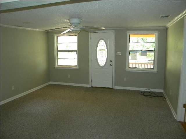 5495 Old River Road Baker, FL 32531 - Photo 3 of 15 an empty room with a window