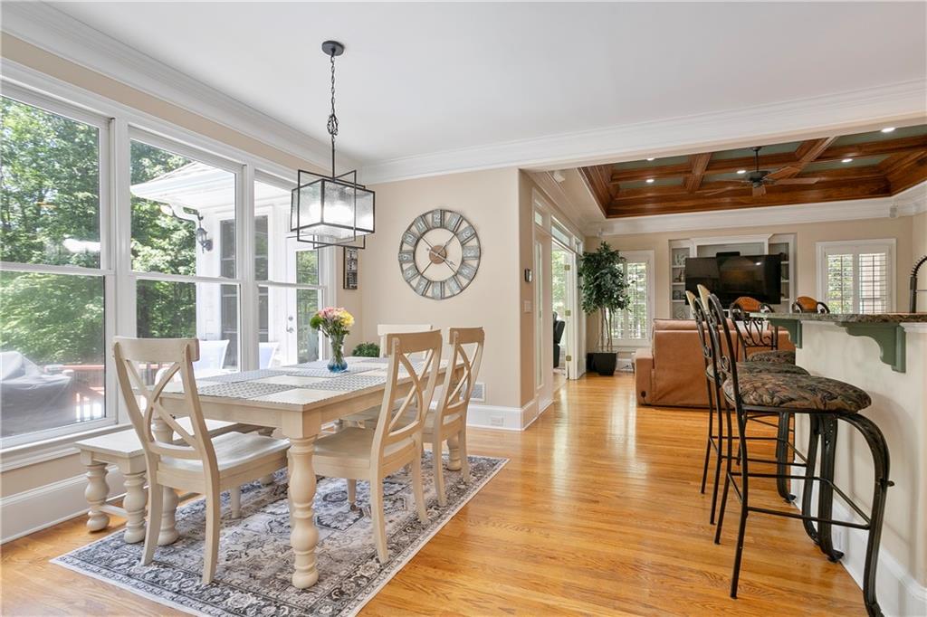 4185 Pool Road Winston, GA 30187 - Photo 13 of 57 a view of a dining room with furniture window and wooden floor