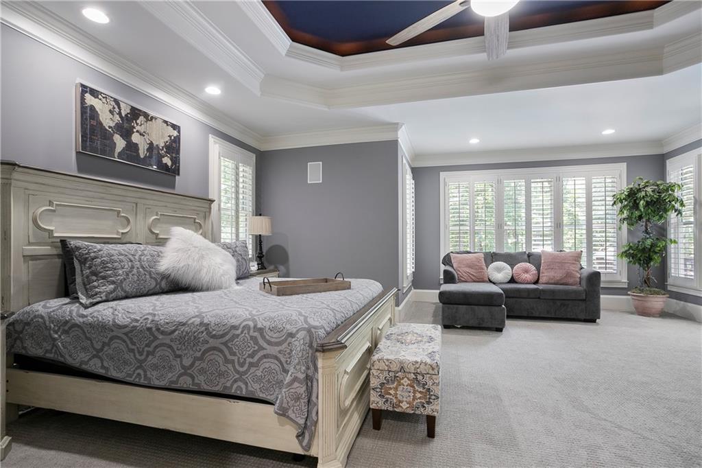 4185 Pool Road Winston, GA 30187 - Photo 27 of 57 a bedroom with a bed couch and a large window